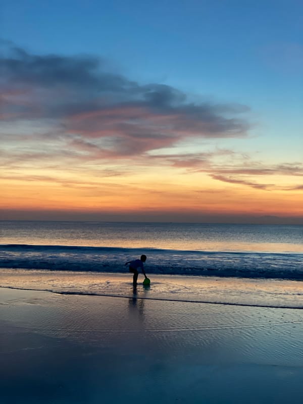 Sunset beach activities and dining captured in Kuta Selatan