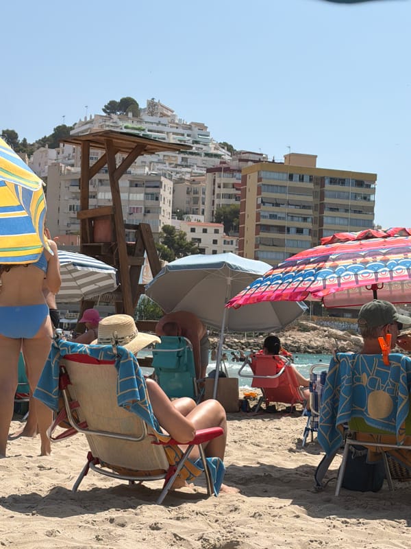 Lazy summer morning on a crowded Costa Blanca beach