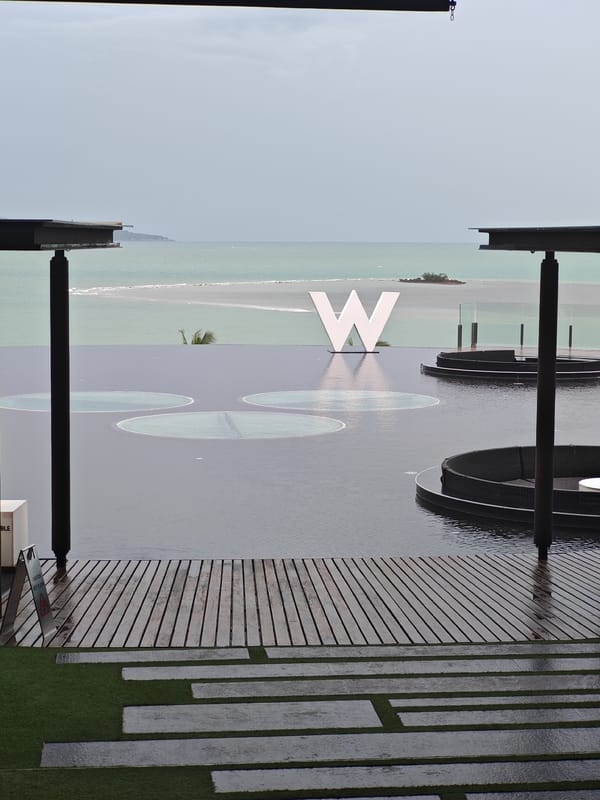 W Koh Samui's infinity pool and ocean-facing sculpture
