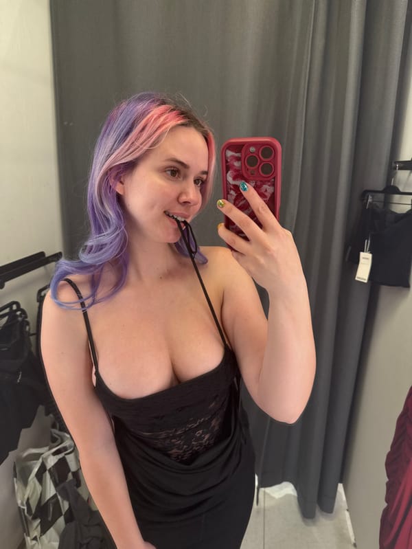 Woman tries on clothes, takes selfies in Zagreb fitting room