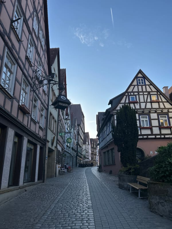 Tourist documents European old town walk ending with kebab meal