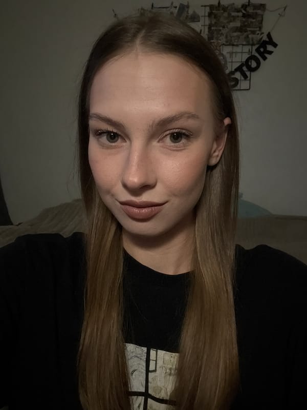 Bedroom selfie session in Perm, trying on different glasses