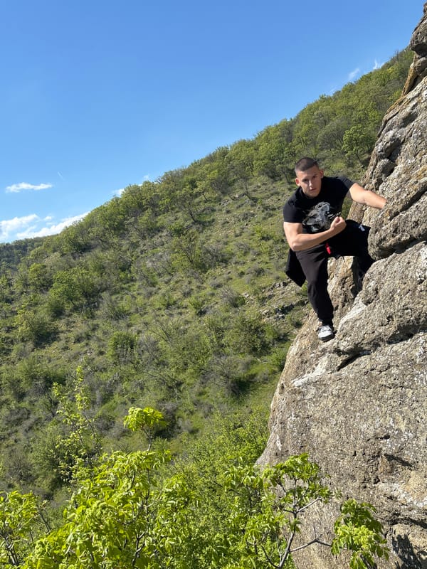 Rock climbers scale cliff face near Goritsa, Bulgaria
