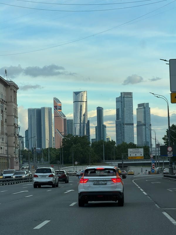 Moscow traffic flows north with City skyline visible
