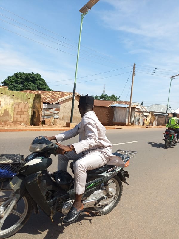 Morning street activity in Arawa, Nigeria