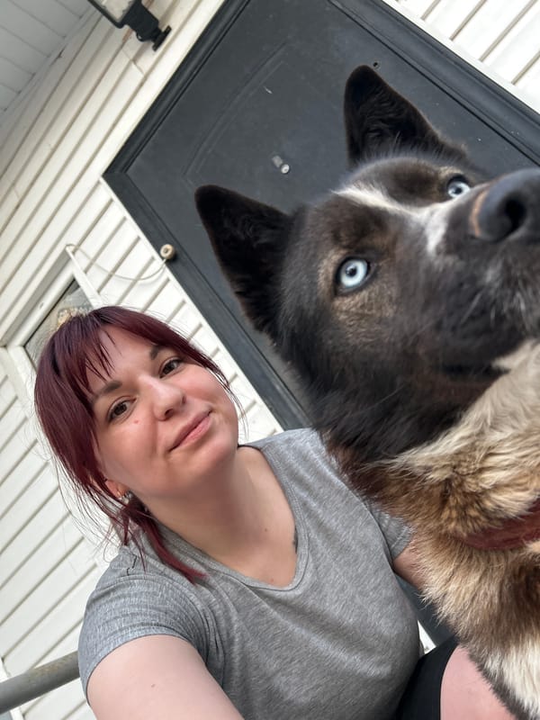 Woman takes selfie with blue-eyed dog in Russia