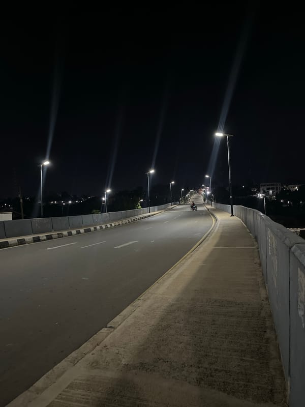 Evening bridge crossing captured in Jos, Nigeria
