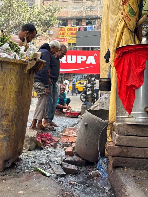 Early morning street life and jewelry work documented in Kolkata
