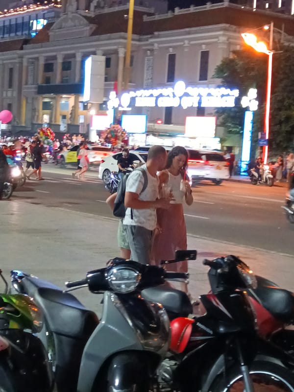 Nha Trang street festival night: dragon dance, crowds, motorbikes
