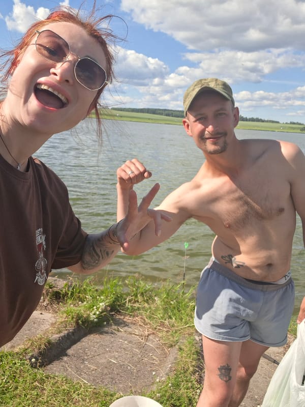 Casual fishing session by a Smolevichi reservoir on a summer afternoon