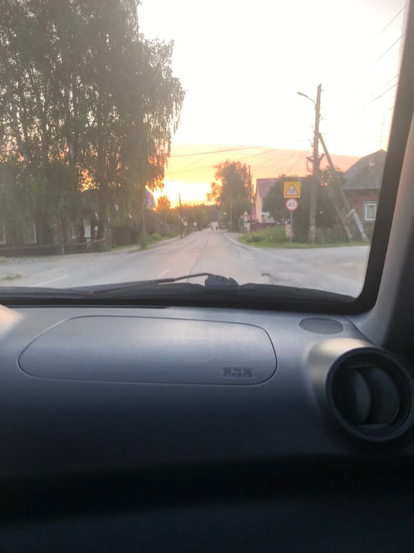 Evening drive through rural Solikamsk at golden hour