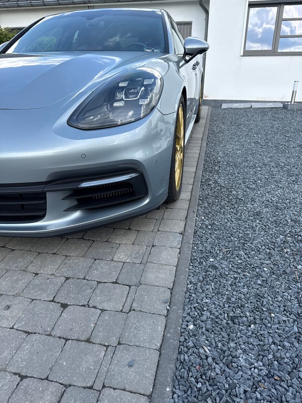 Silver Porsche and backyard hot tub spotted in Belgian town
