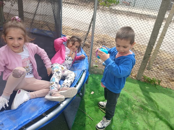 Children play on trampoline in Obrochishte, Bulgaria