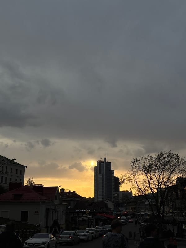 Sunset illuminates Minsk skyline with dramatic cloud contrast
