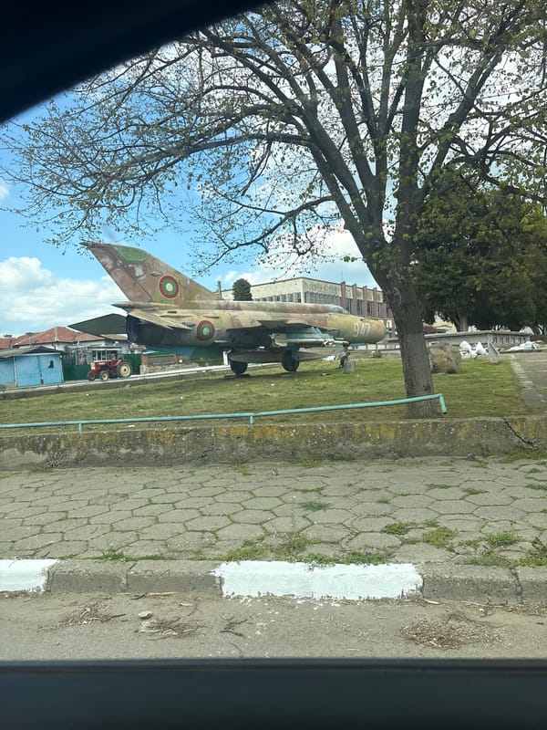 Mixed urban scenes: military aircraft, gardens, vehicle interior documented