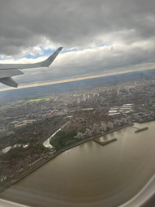 Aerial view of London Thames captured from airplane window