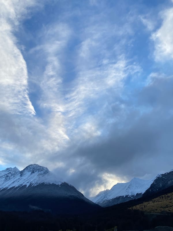 Snow-capped Andes backdrop a Ushuaia construction site