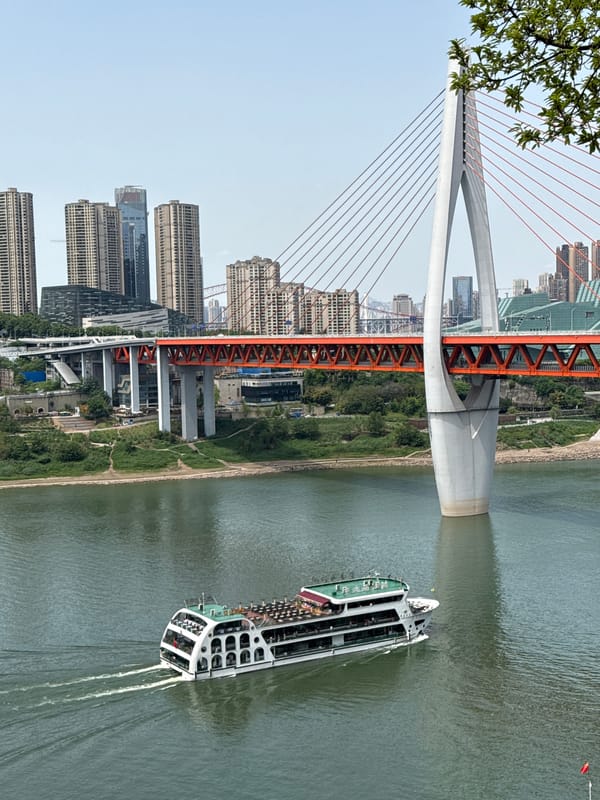 Passenger boat navigates river in Yuzhong District, China