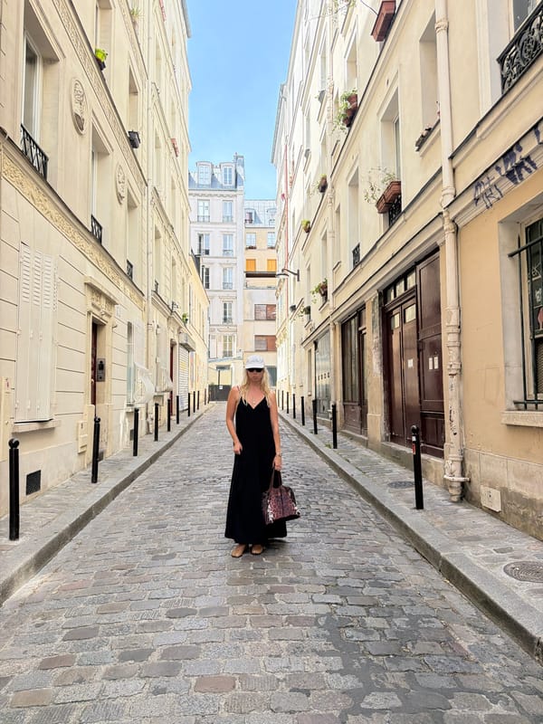 A sunny afternoon wandering cobblestone Paris near Montmartre