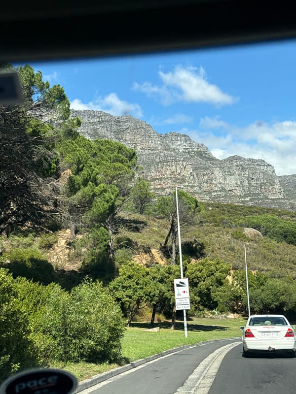 Table Mountain photographed from moving vehicle in Cape Town