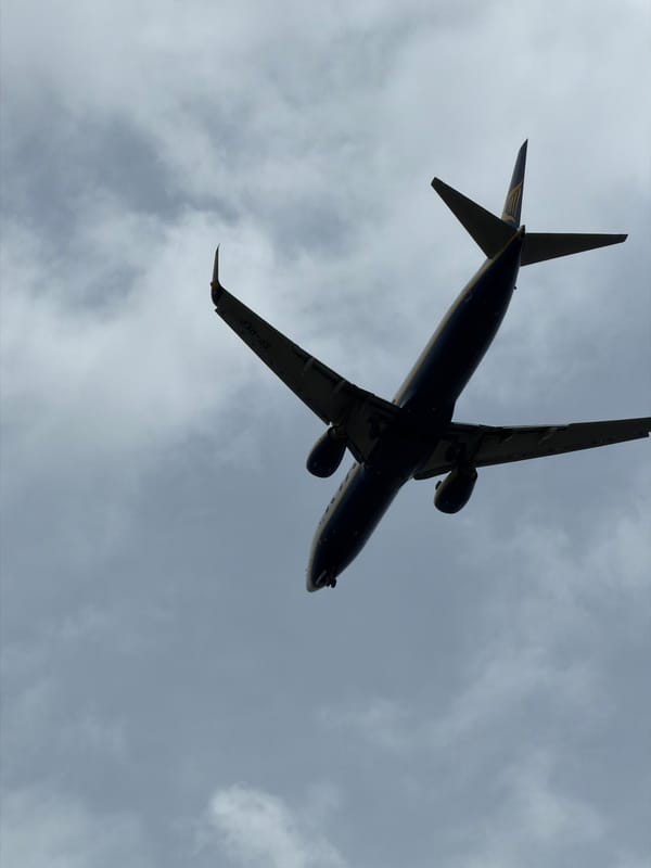 Ryanair approaches Burgas as a mud-splattered BMW rolls nearby