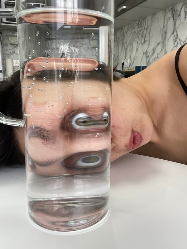 Woman documents breakfast with artistic water glass photography in Izhevsk