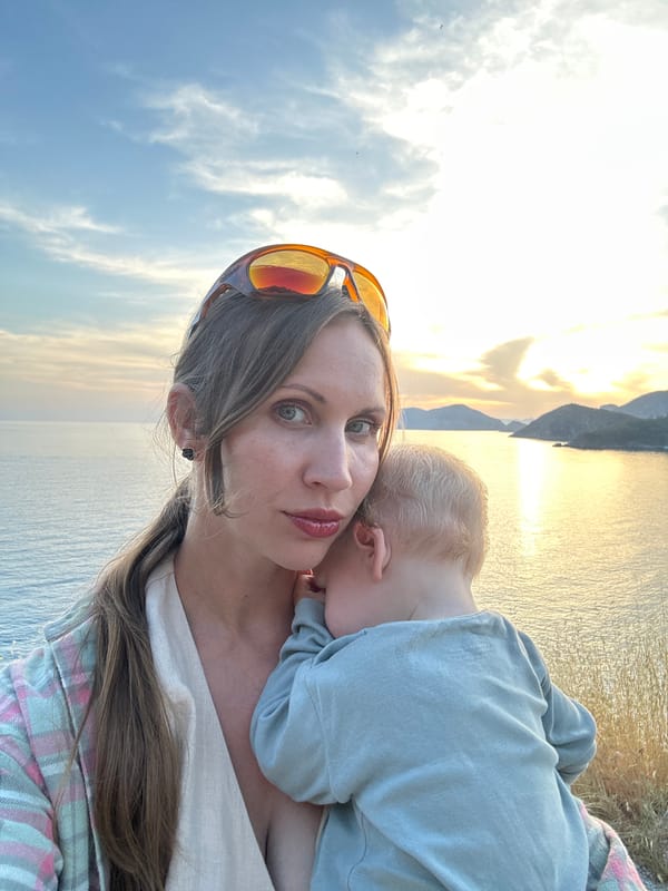 Mother and child enjoy sunset moment in Fethiye, Turkey