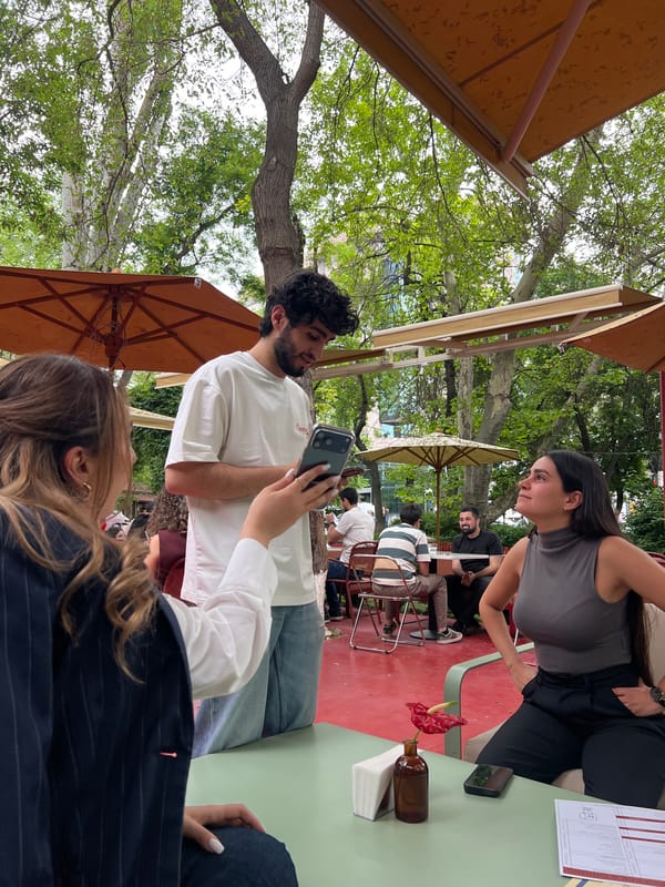 Afternoon cafe gathering captured at TUMO Park in Yerevan