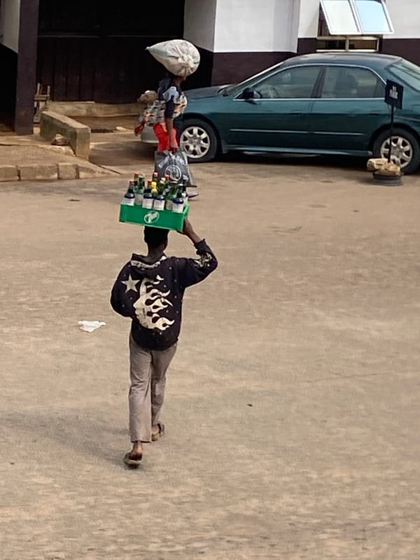 Morning street life and commerce in Bukuru, Nigeria