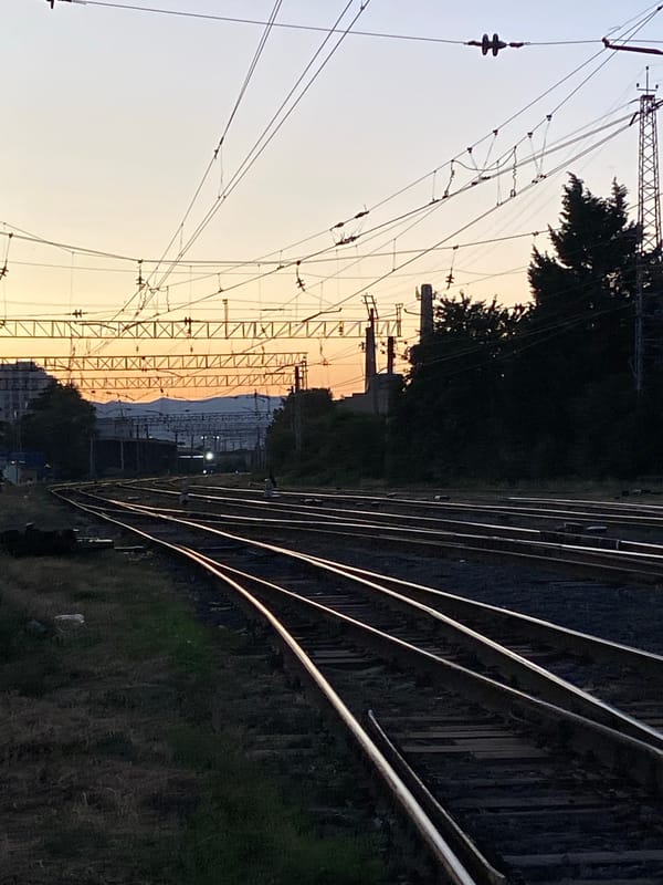 Exploring Tbilisi's railway yard at golden hour