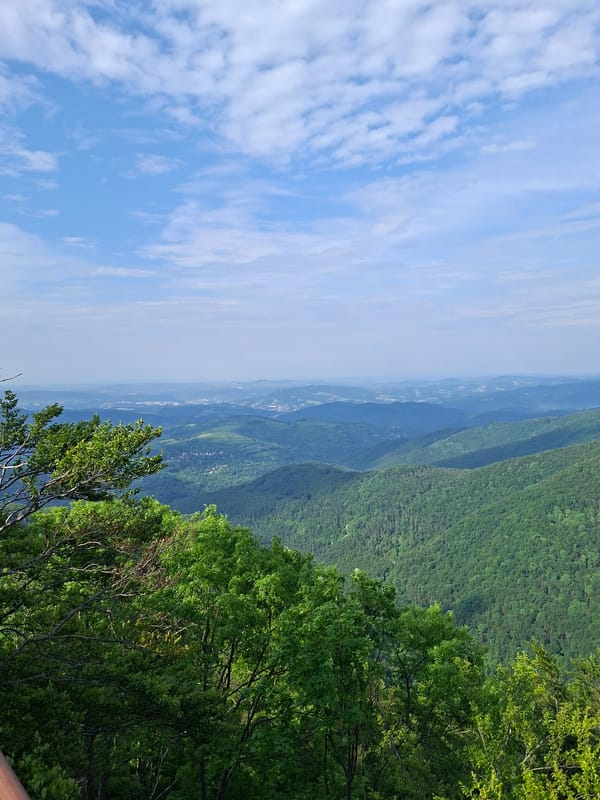 Two men visit heart-shaped viewpoint overlooking Balkan Mountains