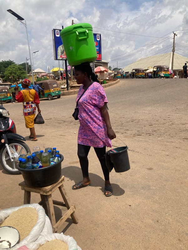 Daily life documented in Nigerian street markets and transport areas
