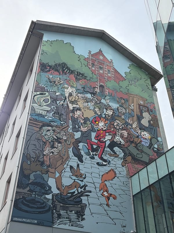 Comic strip mural documented on Brussels building wall