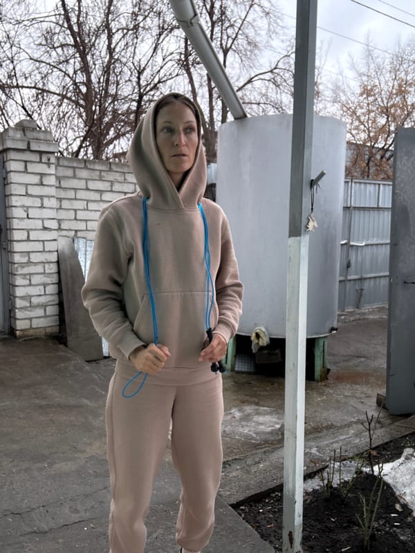 Woman exercises outdoors in Ulyanovsk residential area
