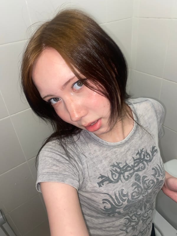 Portrait photos capture person in gray shirt Friday morning