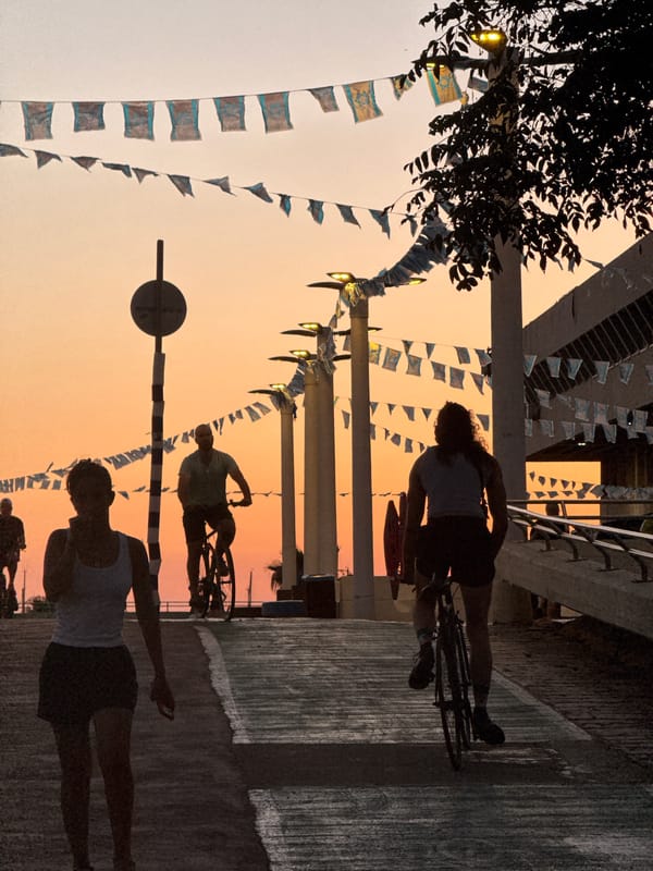 Golden hour along Tel Aviv's promenade and marina