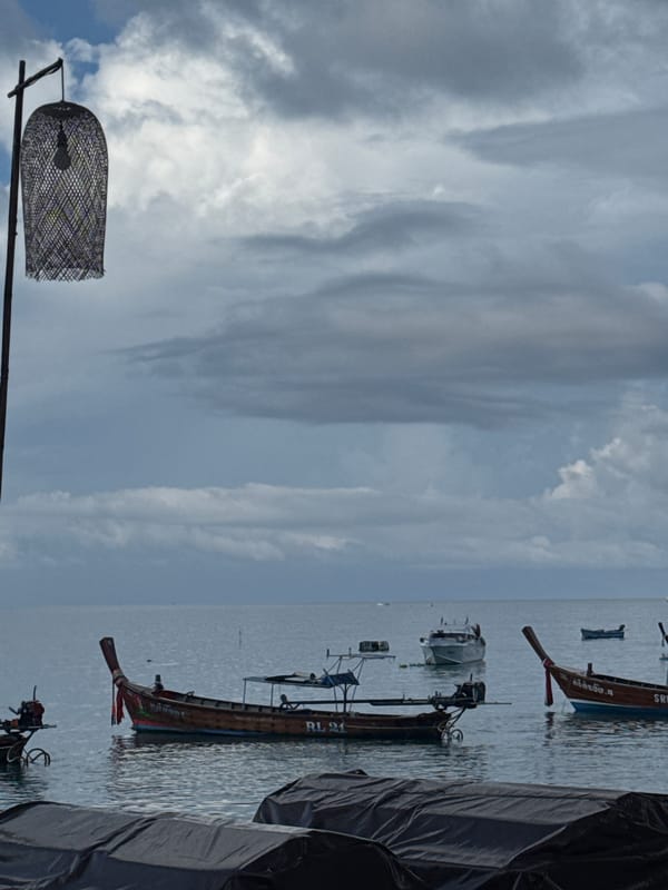 Rawai waterfront scenes with boats, runner, and Thai coastal life