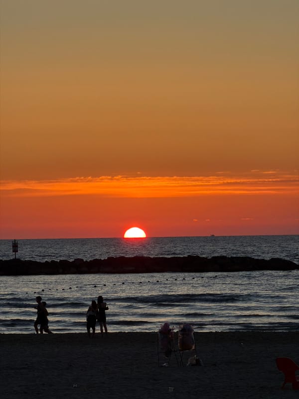 Sunset draws crowds to Tel Aviv beach Friday evening