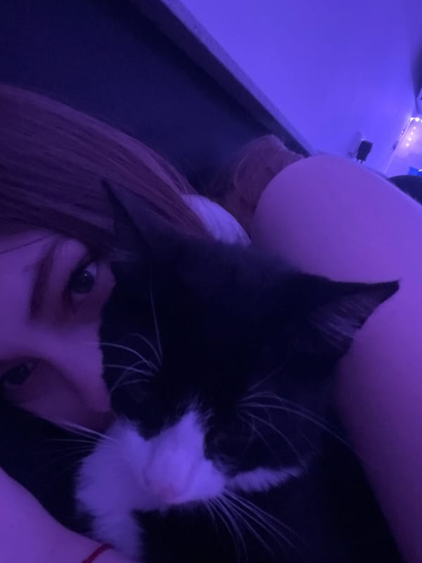 Person photographed with cat on face in Saint Petersburg