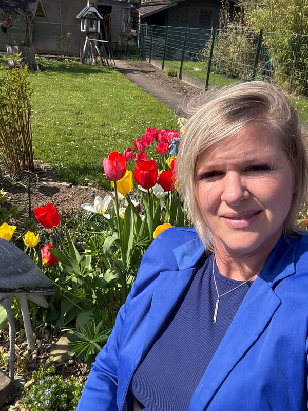 Woman visits tulip garden in Marche-en-Famenne, Belgium