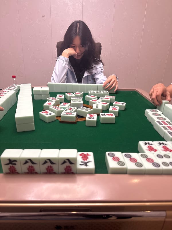 Woman plays mahjong in Nan'an District, China