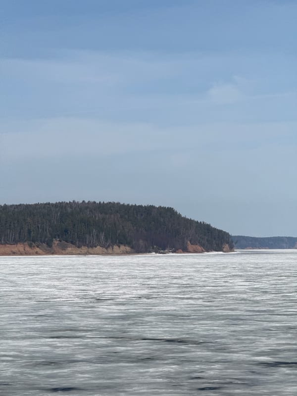 Morning river view captured from vehicle in Chaikovsky, Russia