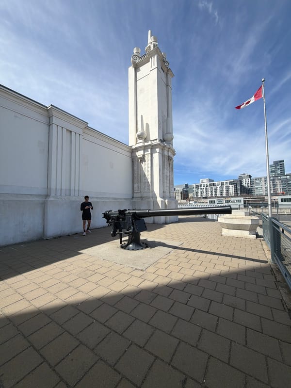 Woman visits historic cannon overlooking Saint Lawrence River in Montreal