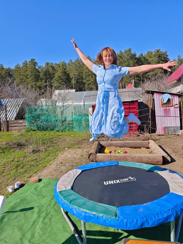 Woman enjoys Sunday backyard leisure time in Noviy, Russia
