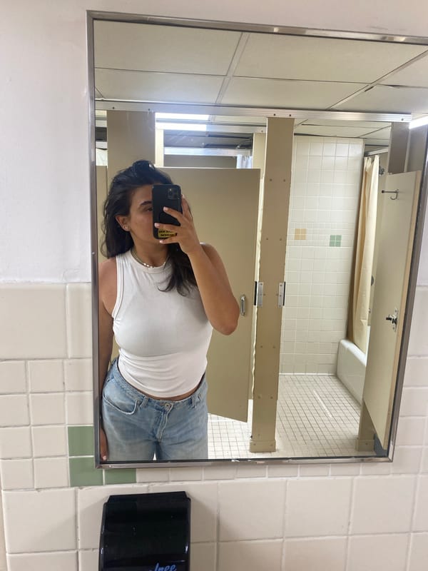 Person spotted in tiled public restroom in New York