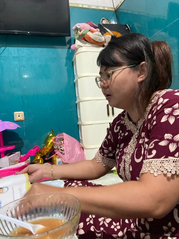 Mother and daughter share quiet afternoon learning time