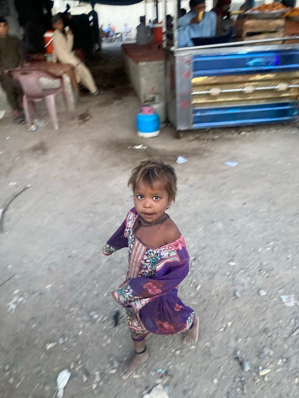 Child photographed in outdoor setting in Uthal, Pakistan
