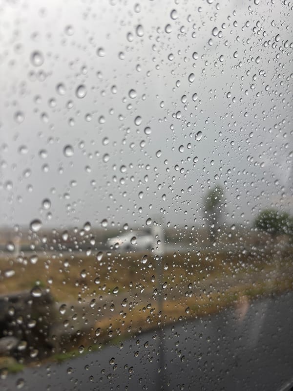 Raindrops observed on window in Santa Clara Ocoyucan