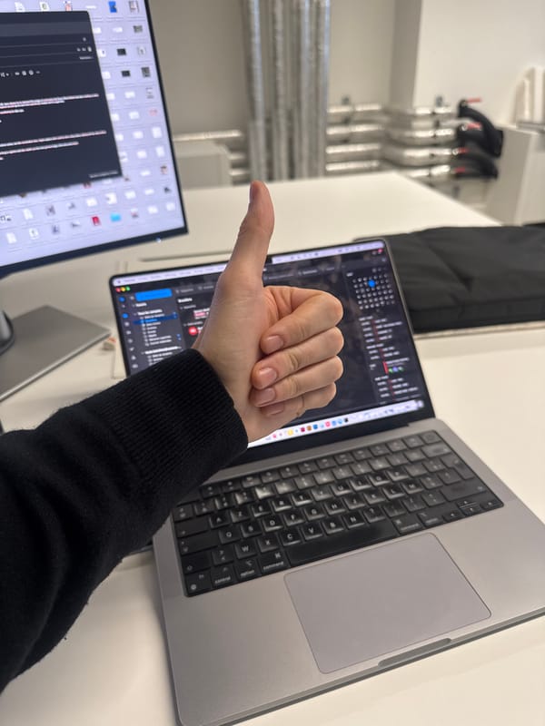 Thumbs up gesture captured at Paris workstation