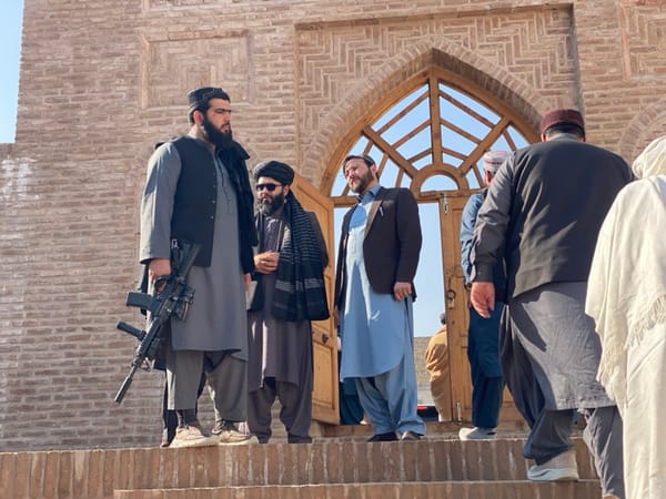 Men gather at religious shrines in Kandahar